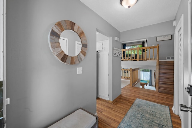 1428 Willow Creek Ln, Shoreview, MN 55126 - hallway with wood finished floors and baseboards
