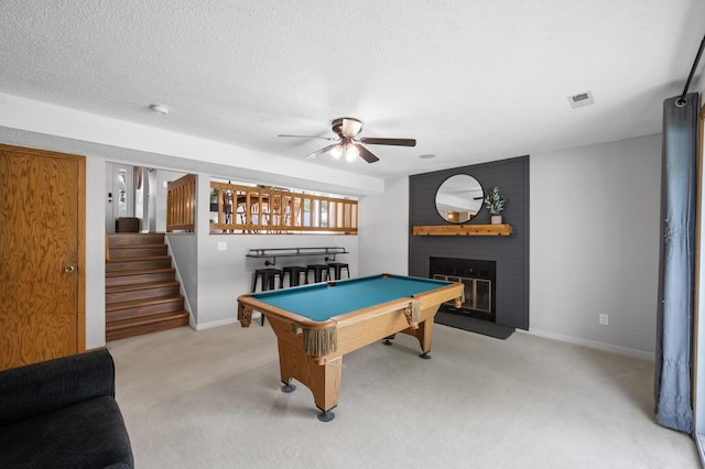 1428 Willow Creek Ln, Shoreview, MN 55126 - playroom featuring a ceiling fan, light colored carpet, a brick fireplace, billiards, and baseboards