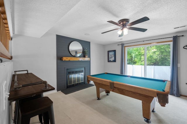 1428 Willow Creek Ln, Shoreview, MN 55126 - playroom with carpet floors, a ceiling fan, pool table, a fireplace, and a textured ceiling