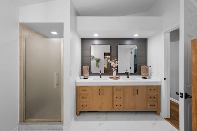1428 Willow Creek Ln, Shoreview, MN 55126 - bathroom with double vanity, a shower stall, baseboards, marble look tiles, and recessed lighting