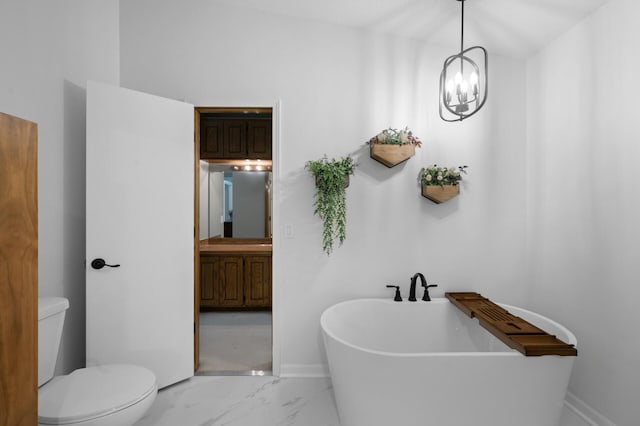 1428 Willow Creek Ln, Shoreview, MN 55126 - full bath with a freestanding bath, marble finish flooring, toilet, and baseboards