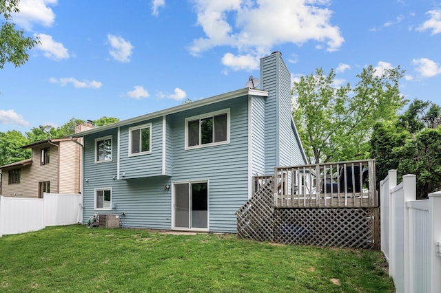 1428 Willow Creek Ln, Shoreview, MN 55126 - back of property with a chimney and a deck