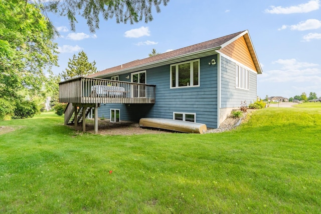 2820 Wilderness Ridge Rd SE, Alexandria, MN 56308 - rear view of property featuring stairs, a deck, and a yard