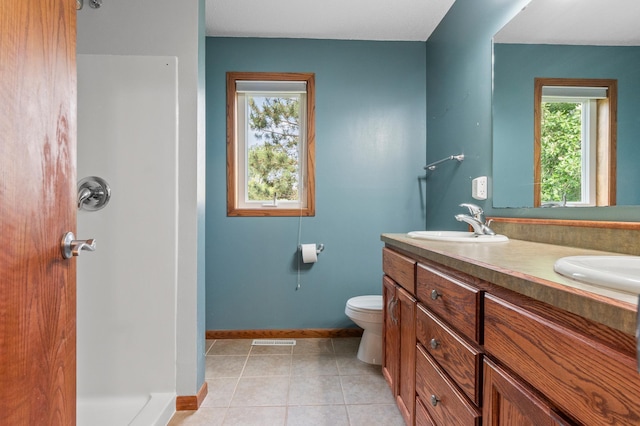 2820 Wilderness Ridge Rd SE, Alexandria, MN 56308 - full bath with double vanity, tile patterned floors, and a shower