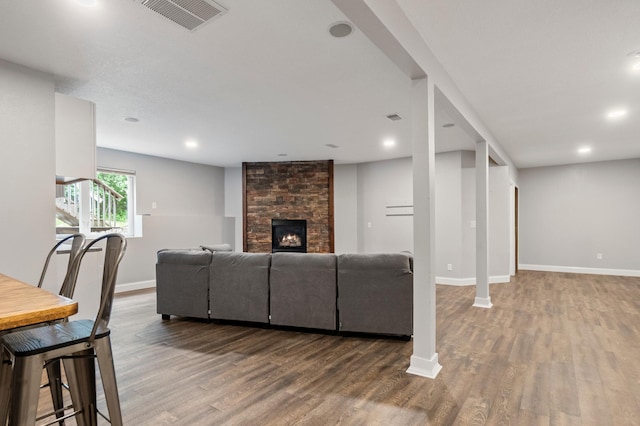 2820 Wilderness Ridge Rd SE, Alexandria, MN 56308 - living area featuring wood finished floors, a fireplace, and recessed lighting