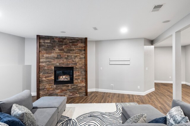 2820 Wilderness Ridge Rd SE, Alexandria, MN 56308 - living room featuring wood finished floors and a fireplace