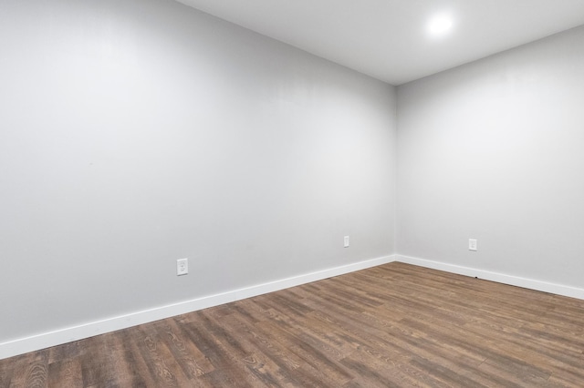 2820 Wilderness Ridge Rd SE, Alexandria, MN 56308 - spare room with dark wood-type flooring and baseboards