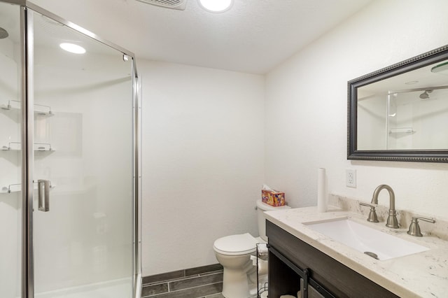 6609 210th Ln N, Forest Lake, MN 55025 - full bath featuring a stall shower, vanity, and wood tiled floors