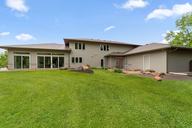 18565 Revere Ave, Spring Lake Twp, MN 55372 - rear view of house with a lawn