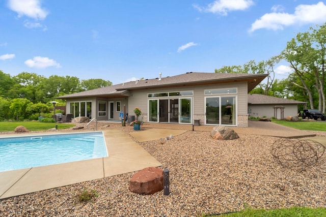 18565 Revere Ave, Spring Lake Twp, MN 55372 - back of property with an outdoor pool, a patio, and central AC unit