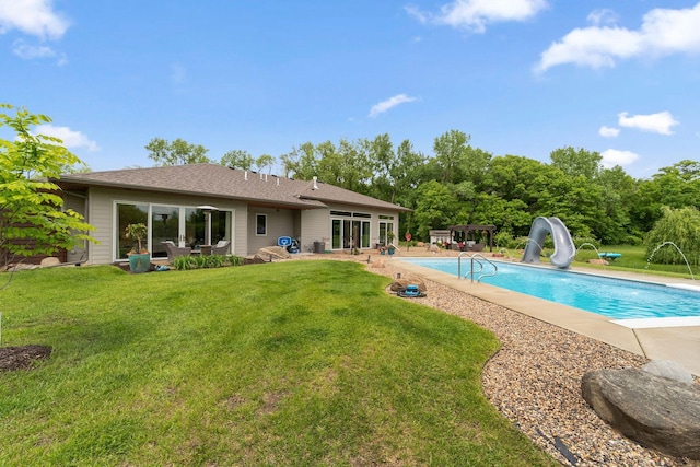 18565 Revere Ave, Spring Lake Twp, MN 55372 - swimming pool featuring a water slide, a lawn, and a patio