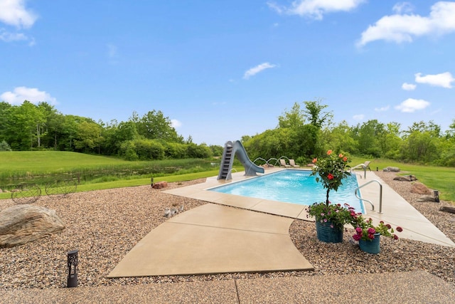 18565 Revere Ave, Spring Lake Twp, MN 55372 - swimming pool with a water slide and a patio