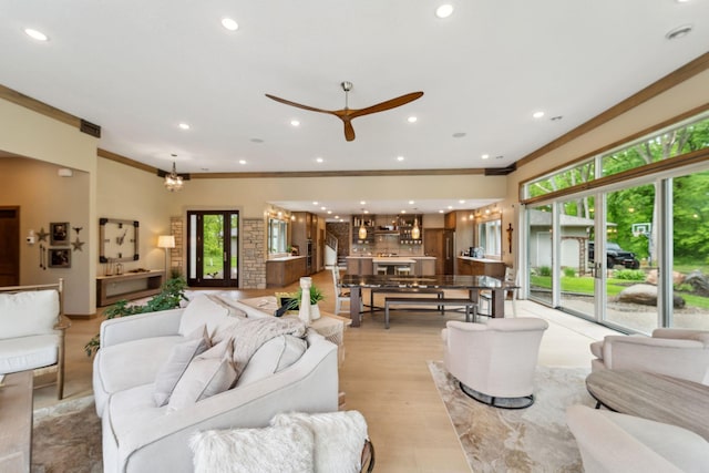 18565 Revere Ave, Spring Lake Twp, MN 55372 - living room with ornamental molding, recessed lighting, ceiling fan, and light wood-style flooring