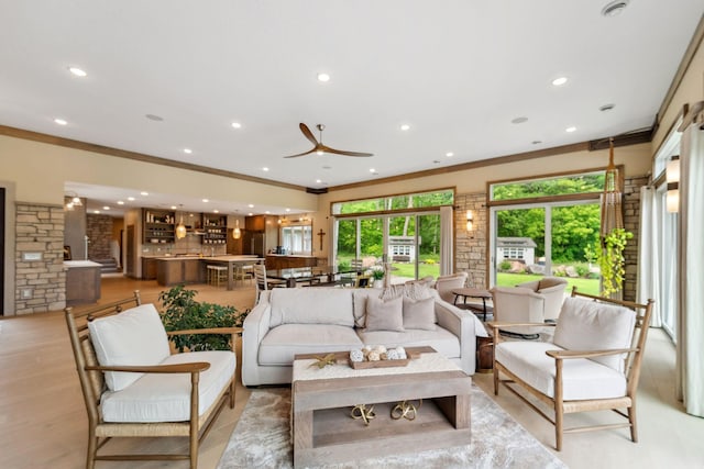18565 Revere Ave, Spring Lake Twp, MN 55372 - living room featuring a ceiling fan, crown molding, and recessed lighting