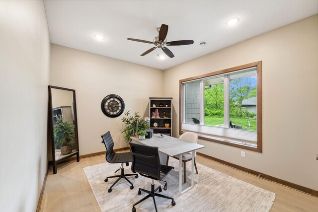 18565 Revere Ave, Spring Lake Twp, MN 55372 - office featuring ceiling fan, baseboards, recessed lighting, and light wood-style flooring