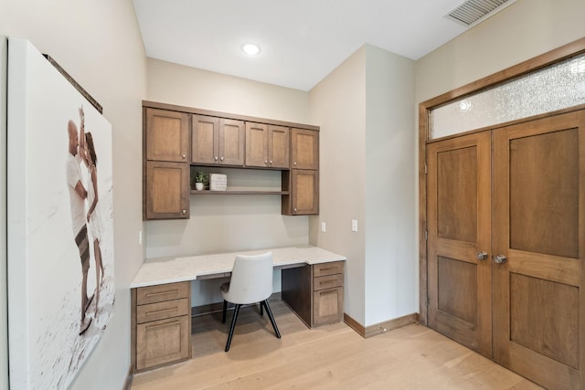 18565 Revere Ave, Spring Lake Twp, MN 55372 - office space with built in desk, light wood-style flooring, and baseboards