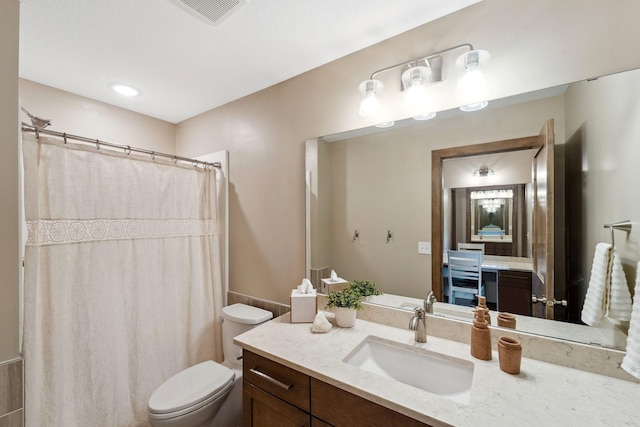 18565 Revere Ave, Spring Lake Twp, MN 55372 - bathroom featuring vanity, toilet, and a shower with curtain