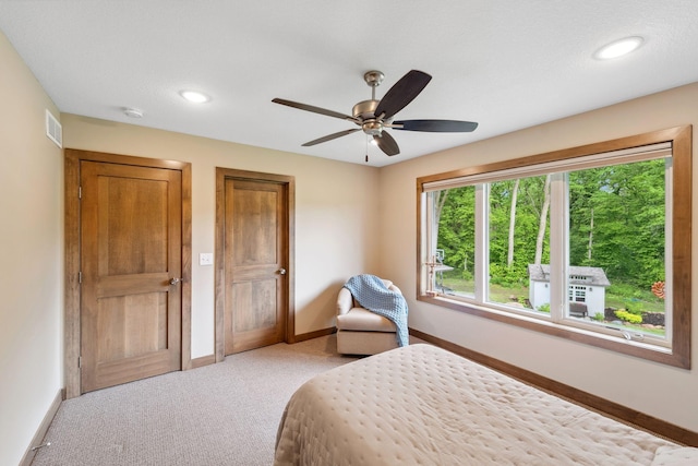 18565 Revere Ave, Spring Lake Twp, MN 55372 - carpeted bedroom featuring baseboards, recessed lighting, and ceiling fan