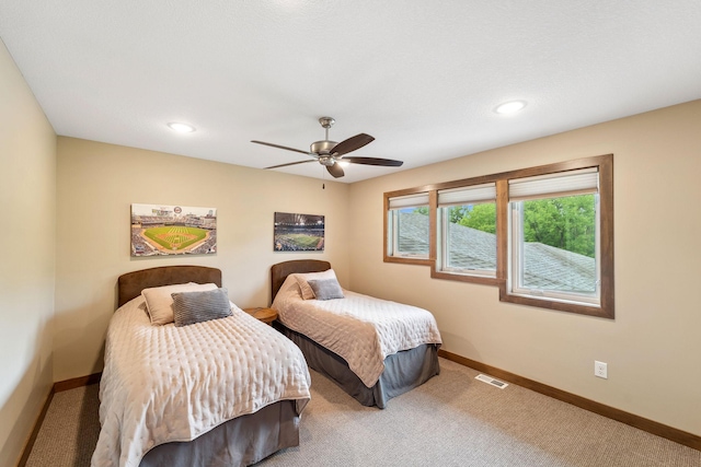 18565 Revere Ave, Spring Lake Twp, MN 55372 - bedroom featuring baseboards, carpet floors, a ceiling fan, and recessed lighting