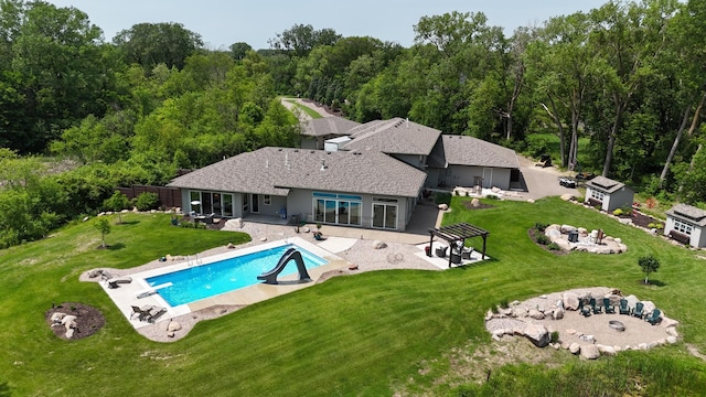 18565 Revere Ave, Spring Lake Twp, MN 55372 - back of house with a patio area and an outdoor pool