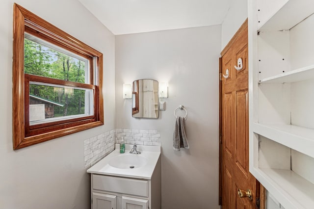 2628 River Rd, Sterling Twp, WI 54024 - bathroom with vanity and tasteful backsplash