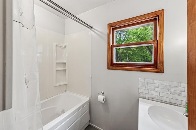 2628 River Rd, Sterling Twp, WI 54024 - full bath with shower / tub combo with curtain, baseboards, and a sink