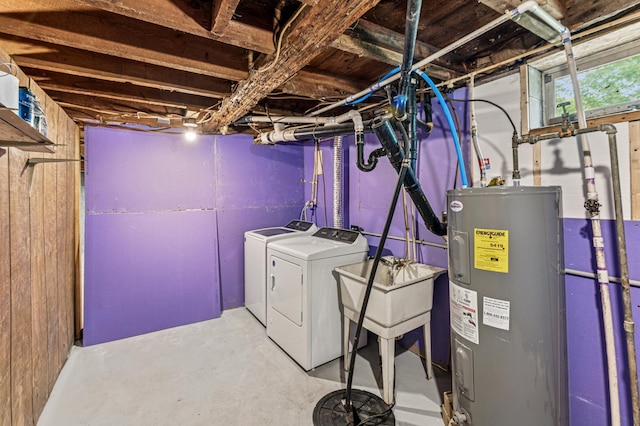 2628 River Rd, Sterling Twp, WI 54024 - washroom featuring water heater and washer and clothes dryer