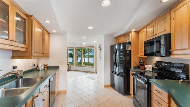 9630 Walleye Rd NW, Brandon, MN 56315 - kitchen with black appliances, light tile patterned floors, recessed lighting, dark countertops, and glass insert cabinets