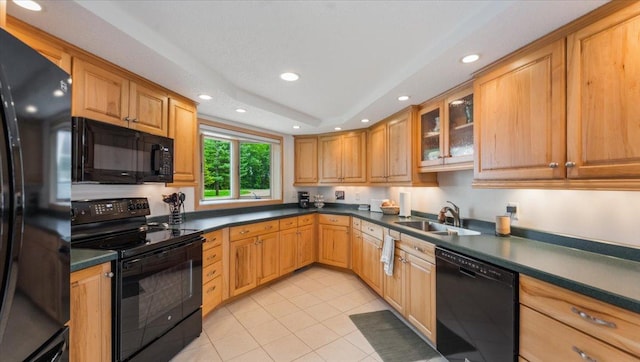 9630 Walleye Rd NW, Brandon, MN 56315 - kitchen with black appliances, recessed lighting, light tile patterned flooring, dark countertops, and glass insert cabinets