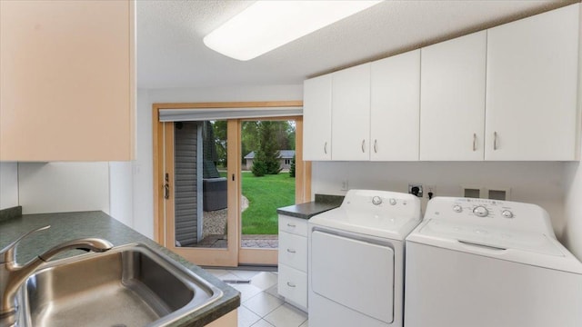 9630 Walleye Rd NW, Brandon, MN 56315 - laundry area featuring cabinet space, washing machine and clothes dryer, light tile patterned floors, and a textured ceiling