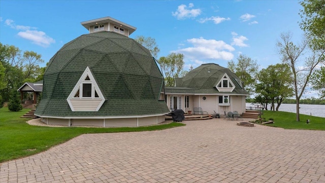 9630 Walleye Rd NW, Brandon, MN 56315 - view of front of house with a front lawn and a water view