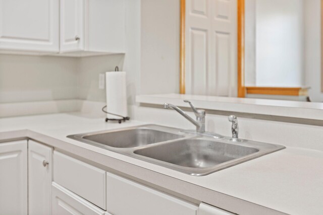 13848 52nd Ave N, Plymouth, MN 55446 - kitchen with a sink, white cabinets, and light countertops