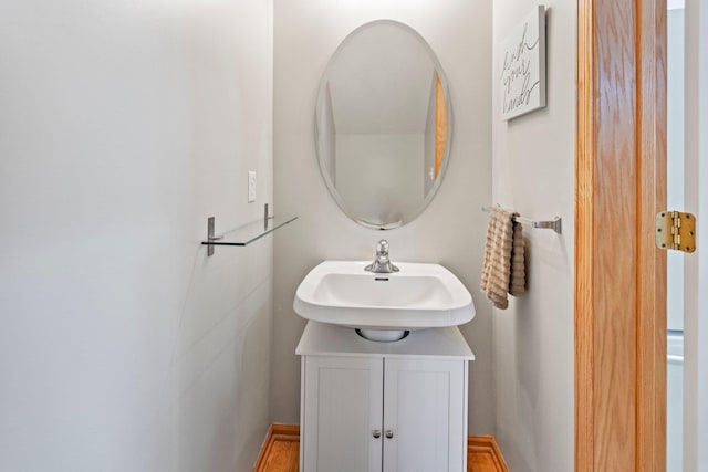 13848 52nd Ave N, Plymouth, MN 55446 - bathroom with baseboards and vanity