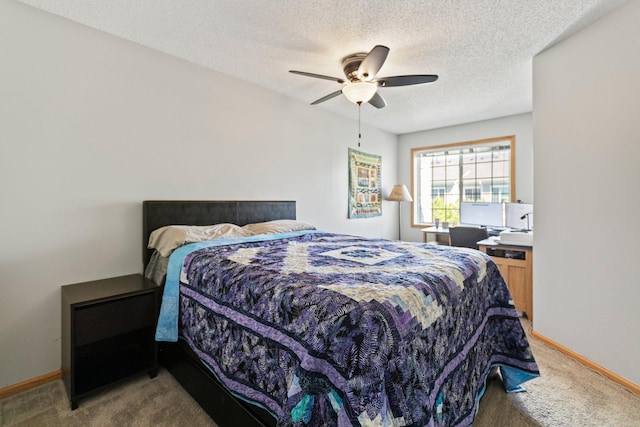 13848 52nd Ave N, Plymouth, MN 55446 - bedroom featuring carpet, a textured ceiling, baseboards, and a ceiling fan