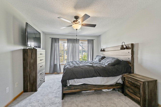 13848 52nd Ave N, Plymouth, MN 55446 - bedroom featuring light colored carpet, a textured ceiling, and a ceiling fan
