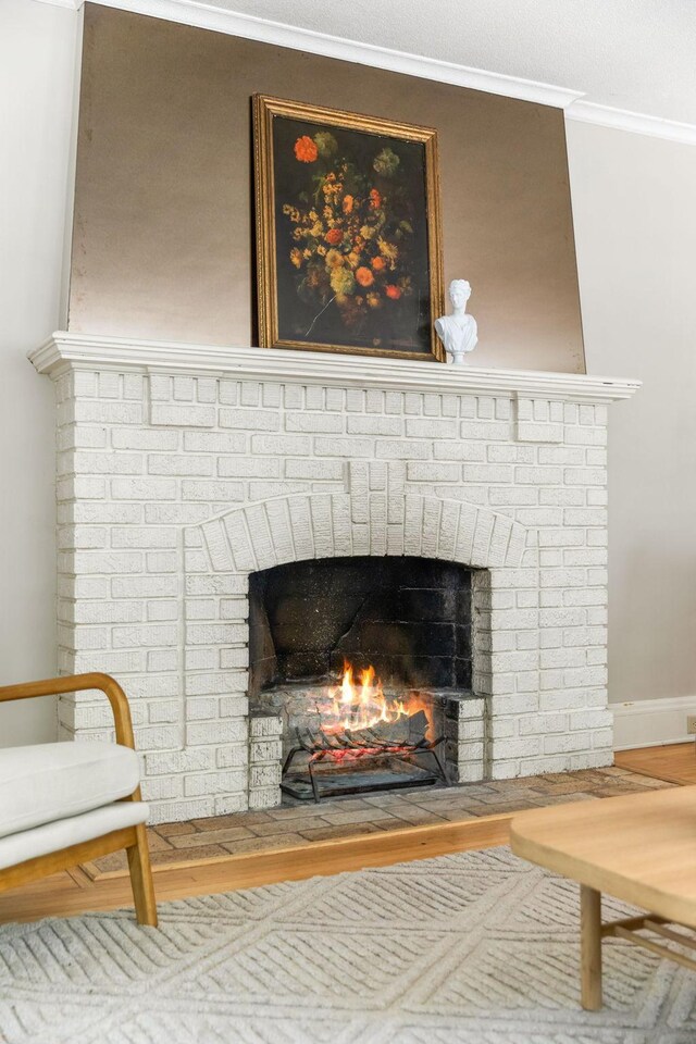 2901 Vincent Ave N, Minneapolis, MN 55411 - detailed view of a fireplace, wood finished floors, and ornamental molding