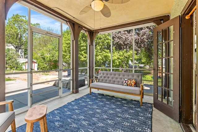 2901 Vincent Ave N, Minneapolis, MN 55411 - sunroom / solarium featuring a ceiling fan, an outdoor living space, and view of scattered trees