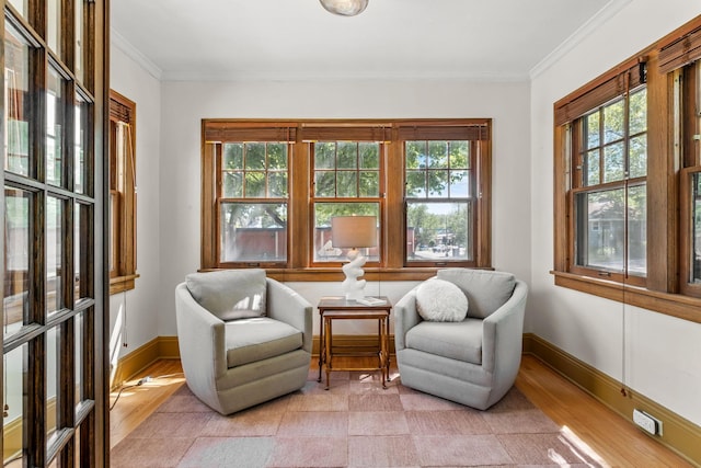 2901 Vincent Ave N, Minneapolis, MN 55411 - living area featuring healthy amount of natural light, ornamental molding, light wood-style floors, and baseboards