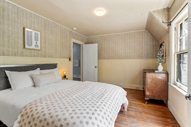 2901 Vincent Ave N, Minneapolis, MN 55411 - bedroom with wood finished floors, wallpapered walls, a wainscoted wall, and ornamental molding