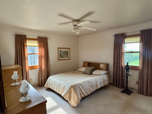 1001 Birch Ave, Olivia, MN 56277 - carpeted bedroom featuring a ceiling fan
