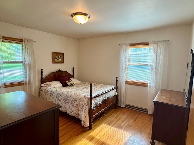 1001 Birch Ave, Olivia, MN 56277 - bedroom featuring light wood finished floors
