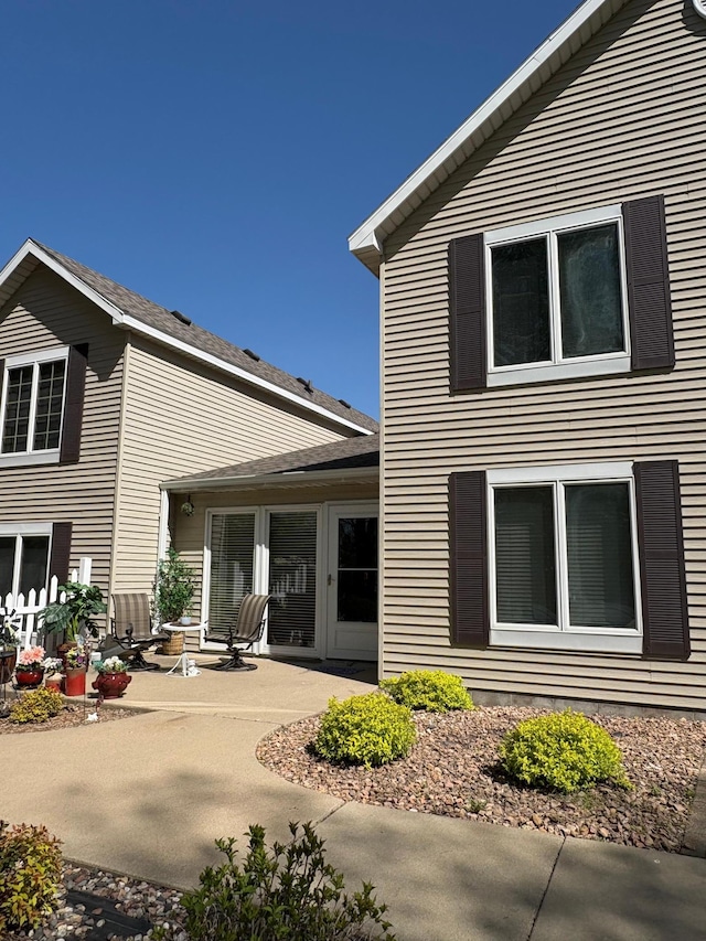 40 Broadway, Plainview, MN 55964 - rear view of house with a patio