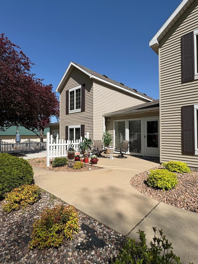 40 Broadway, Plainview, MN 55964 - back of property featuring fence and a patio area