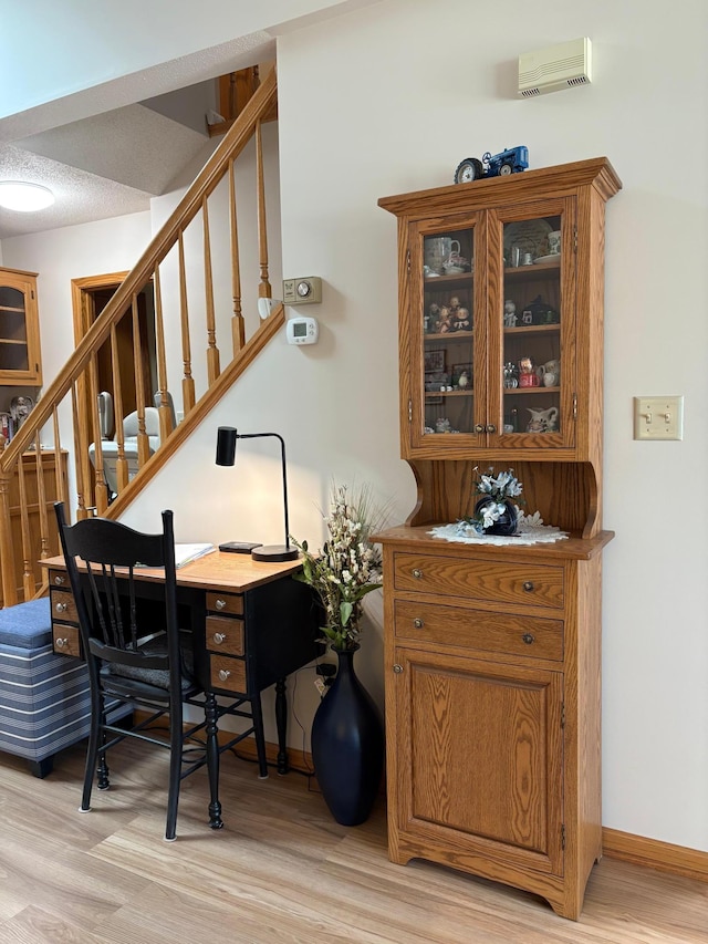40 Broadway, Plainview, MN 55964 - office area with light wood-style flooring and baseboards