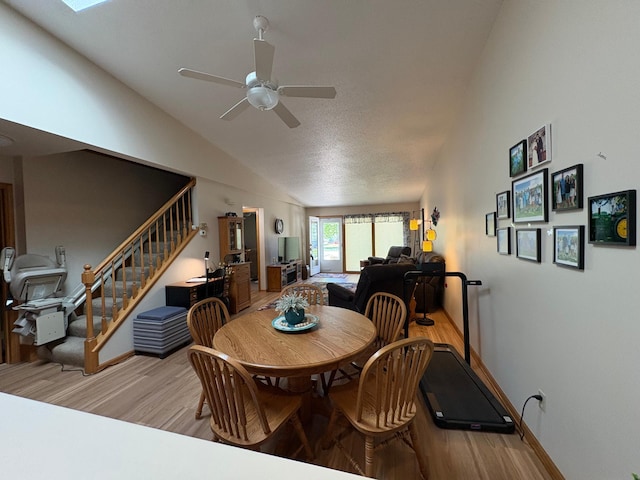 40 Broadway, Plainview, MN 55964 - dining room with light wood finished floors, vaulted ceiling, ceiling fan, stairway, and baseboards