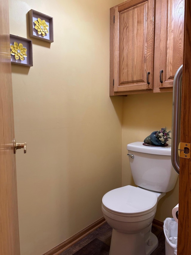 40 Broadway, Plainview, MN 55964 - bathroom with toilet, baseboards, and wood finished floors