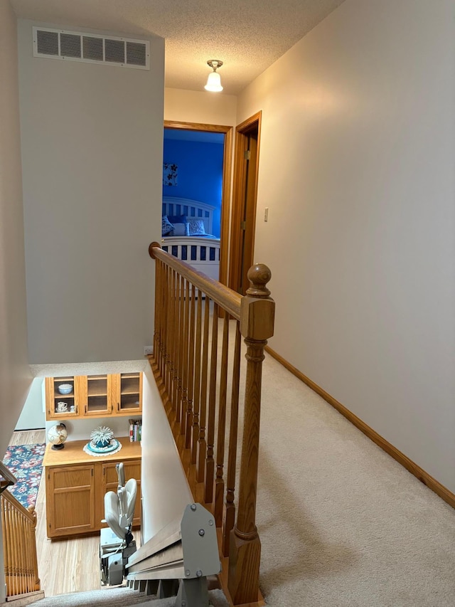 40 Broadway, Plainview, MN 55964 - stairs with carpet and baseboards