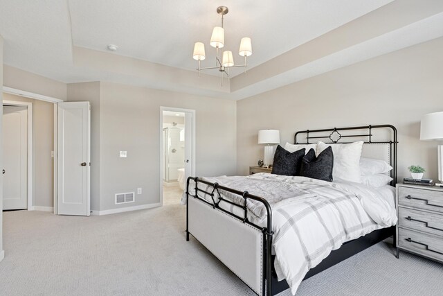 5107 Allen Dr, Woodbury, MN 55129 - bedroom with light carpet, a chandelier, baseboards, and ensuite bath