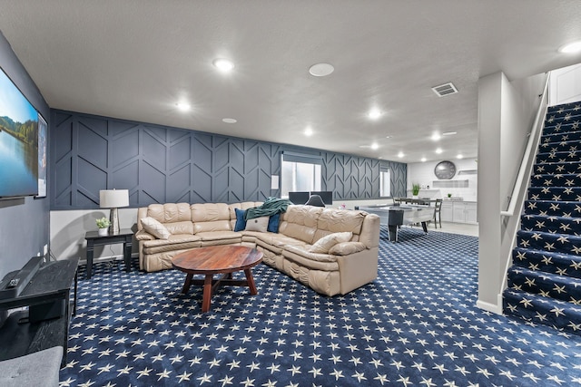 6317 153rd St, Savage, MN 55378 - living room featuring carpet floors, a decorative wall, and recessed lighting
