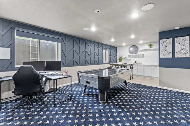 6317 153rd St, Savage, MN 55378 - playroom with carpet floors, recessed lighting, baseboards, a desk, and a textured ceiling